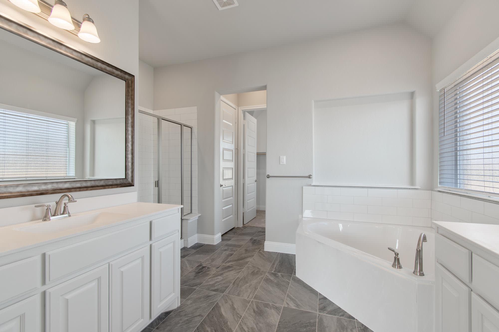 Primary Bathroom | Concept 2623 at Mockingbird Hills in Joshua, TX by Landsea Homes