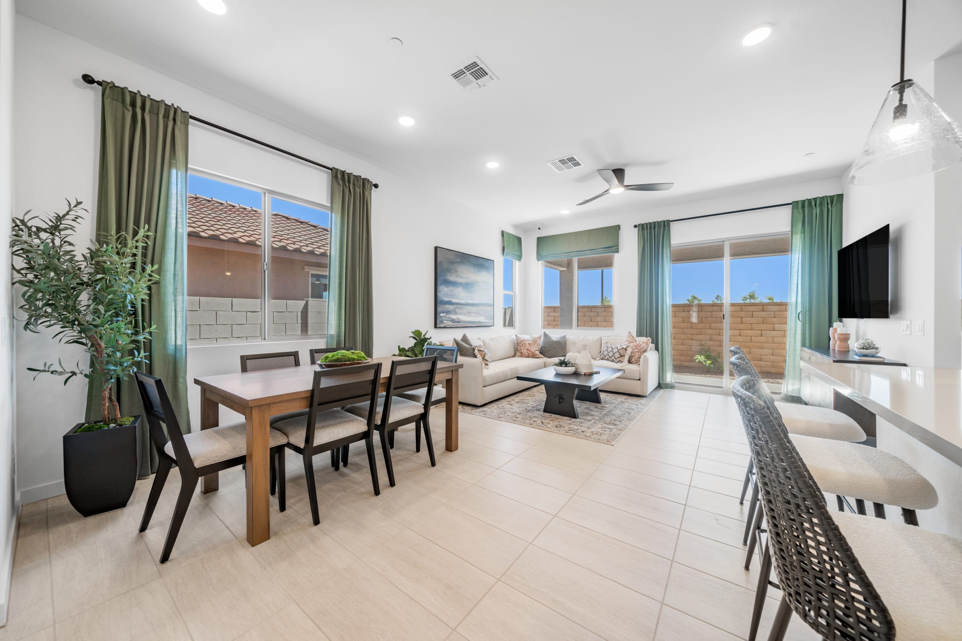 Dining Room & Great Room | Brisa Model Home | Mira Vista at Victory in Buckeye, AZ by Landsea Homes