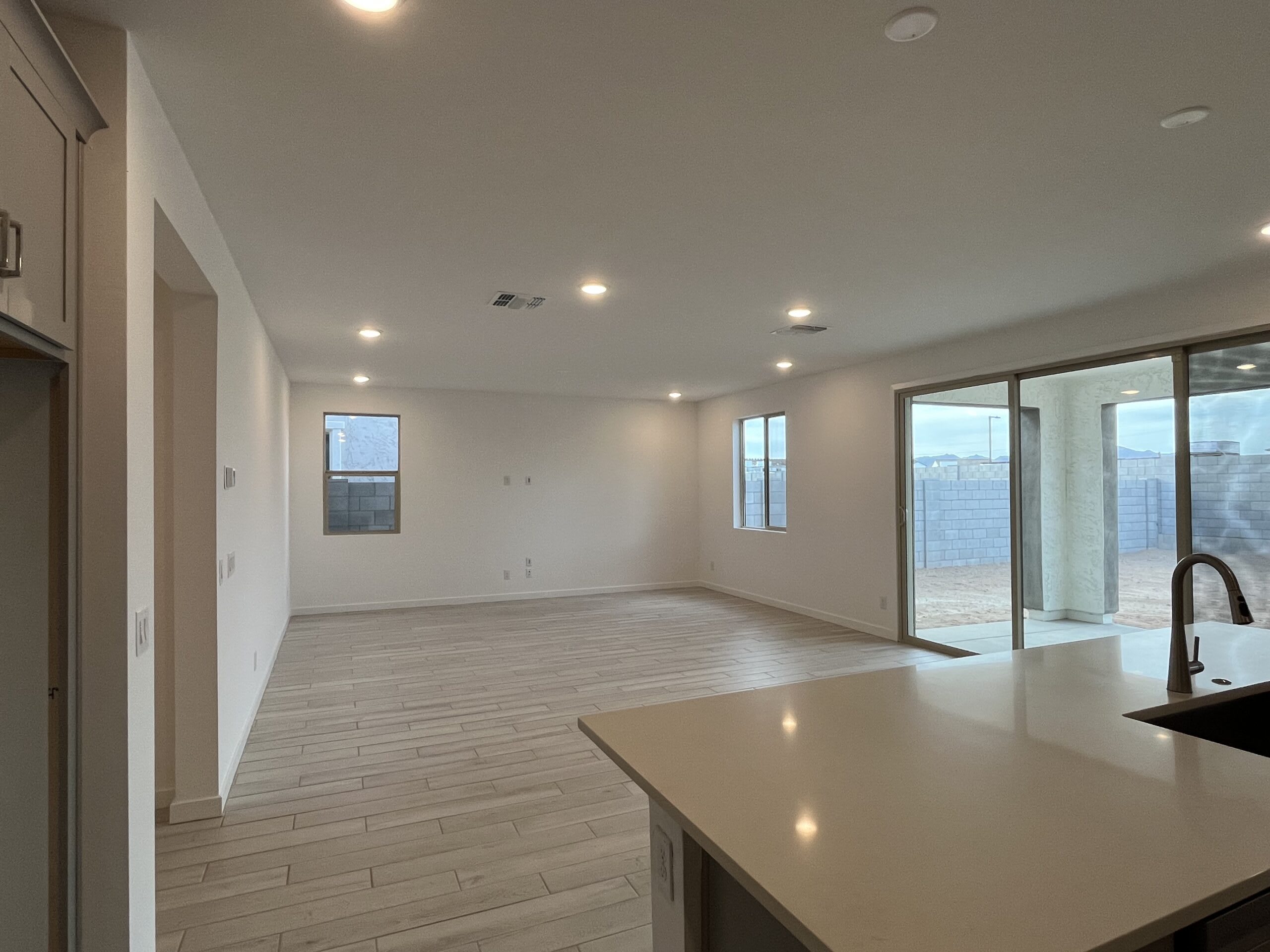 Lot 99 | Kitchen Dining & Great Room | Alani | Harvest at Citrus Park | New Homes in Goodyear, AZ | Landsea Homes