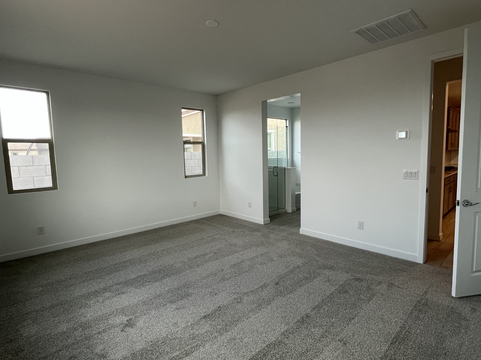 Lot 99 | Primary Bedroom | Alani | Harvest at Citrus Park | New Homes in Goodyear, AZ | Landsea Homes