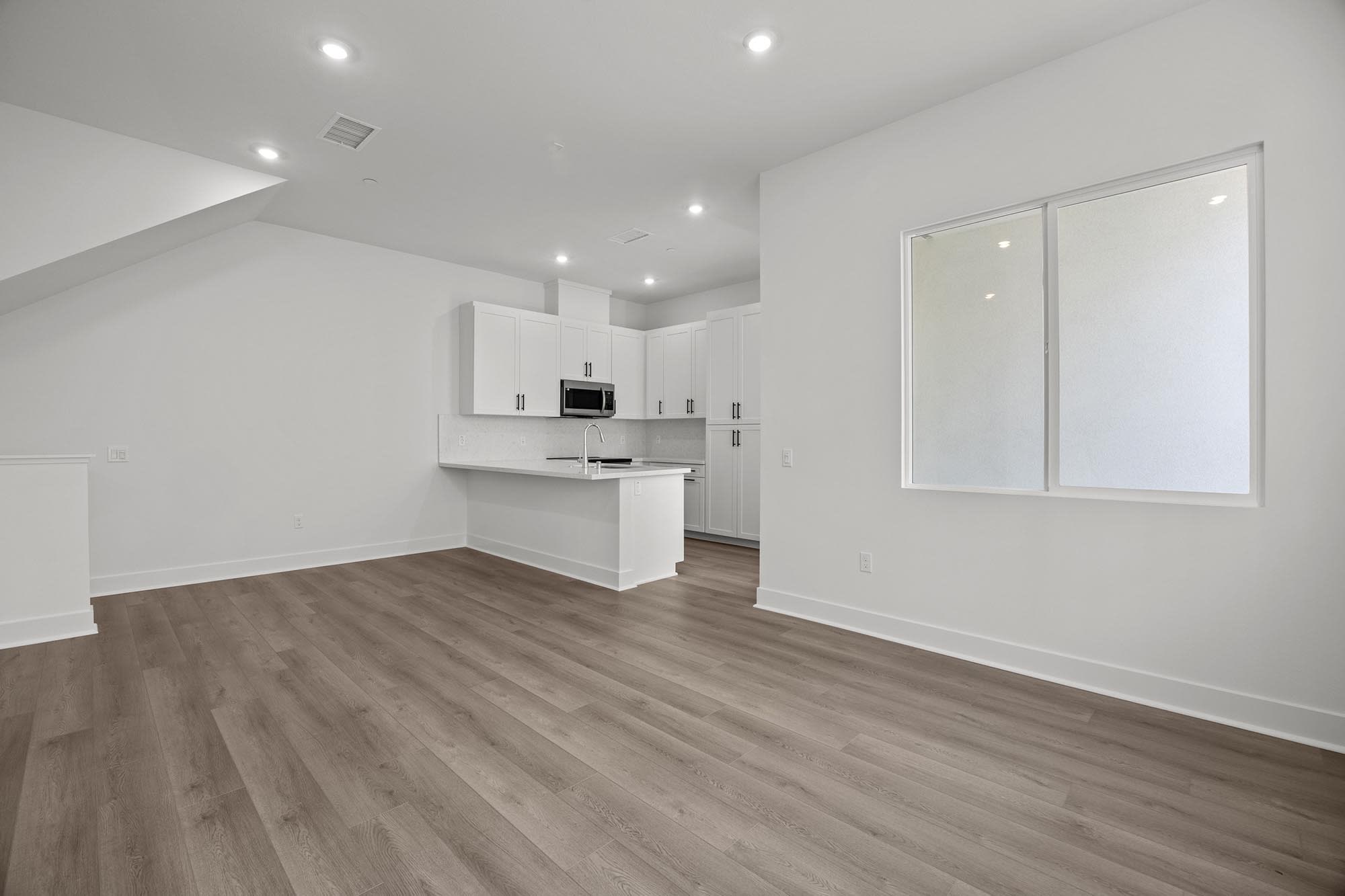 Dining Room & Kitchen – Plan One | Essex + Gage in Huntington Beach, CA by Landsea Homes