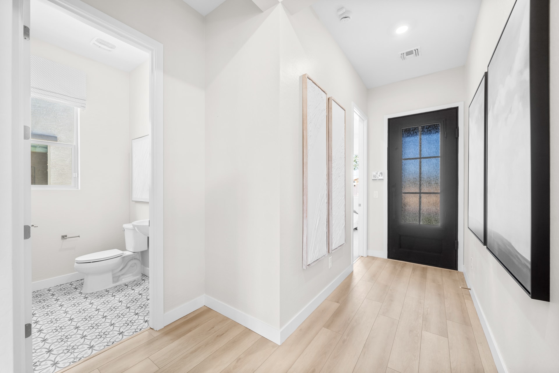 Front Door & Powder Bathroom | Libra Model Home | Rialta | New homes in Mesa, Arizona | Landsea Homes