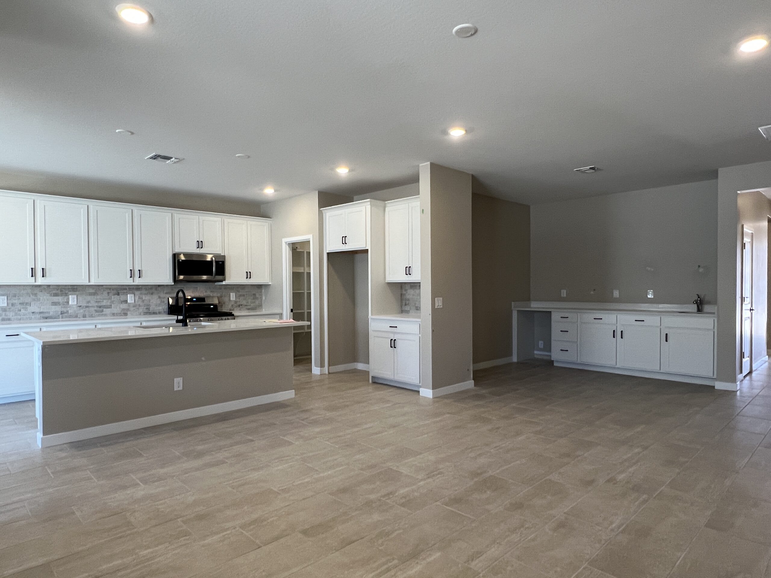 Lot 64 | Kitchen & Great Room | Falcon | El Cidro | Goodyear, AZ | Landsea Homes