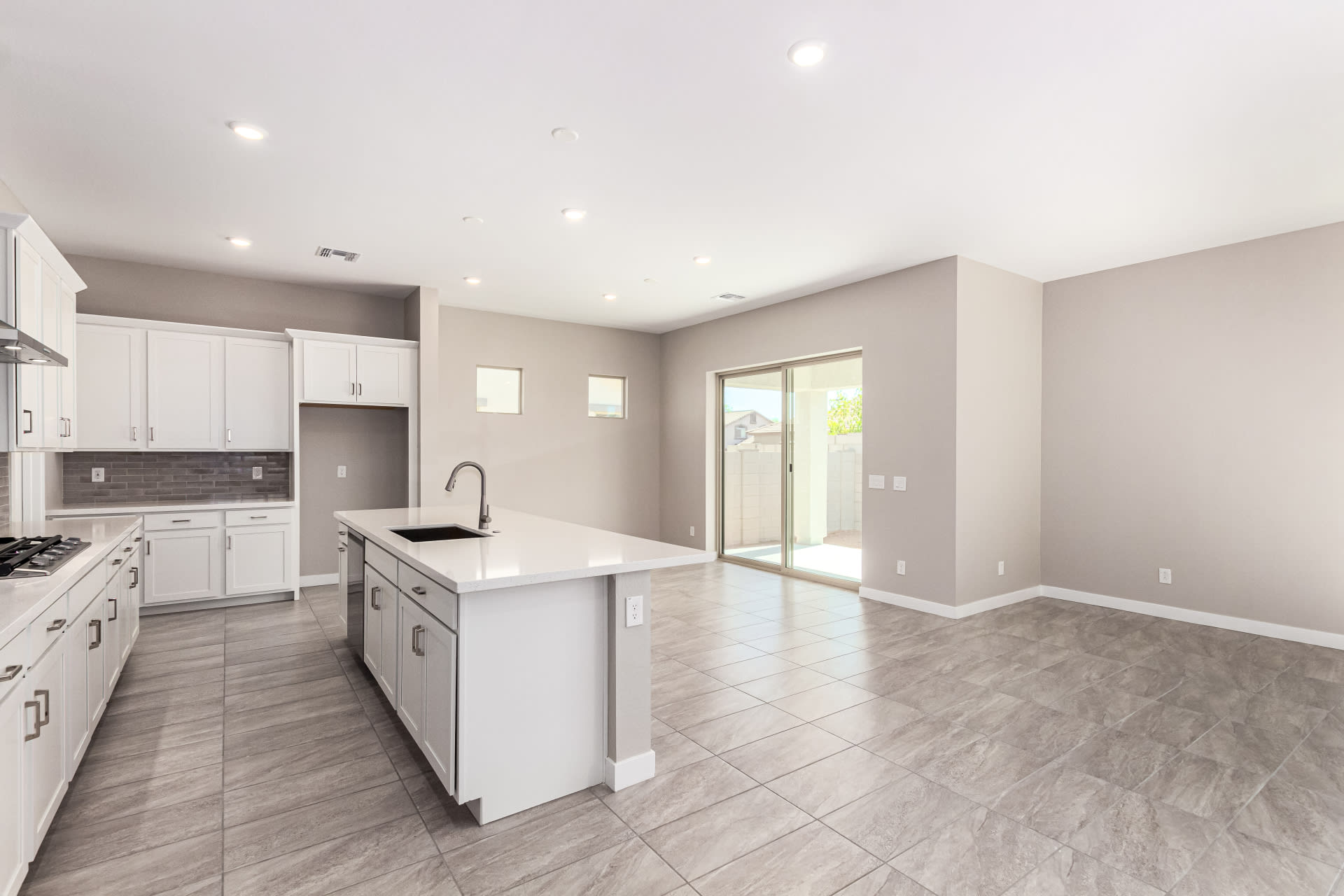 Lot 5 | Kitchen Island & Dining Room | Virgo Floorplan at Rialta | New Homes in Mesa, AZ by Landsea Homes