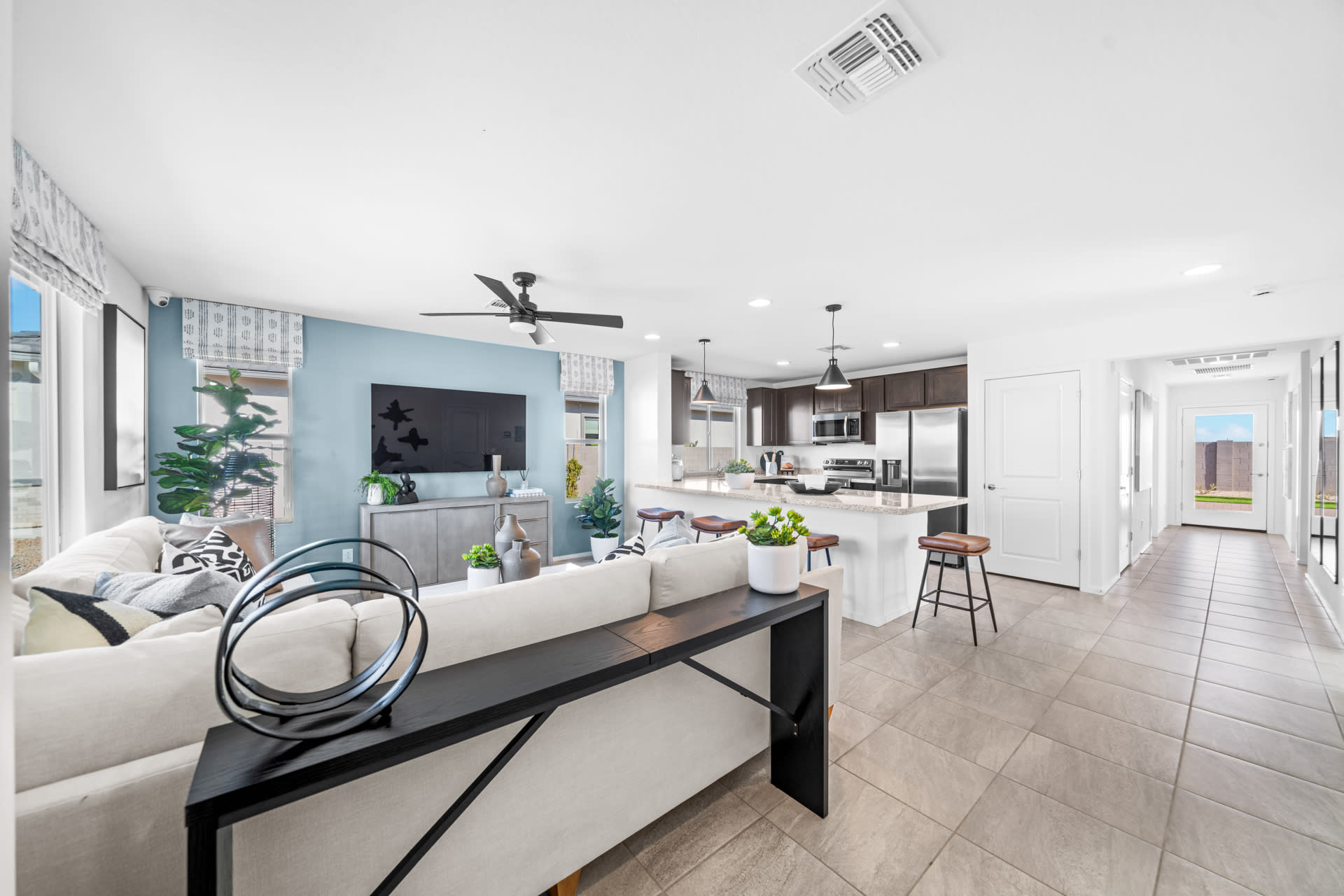 Open Great Room & Kitchen with Hallway to Backyard | Pinnacle | Wildera – Crest Series | New Homes in San Tan Valley, AZ by Landsea Homes