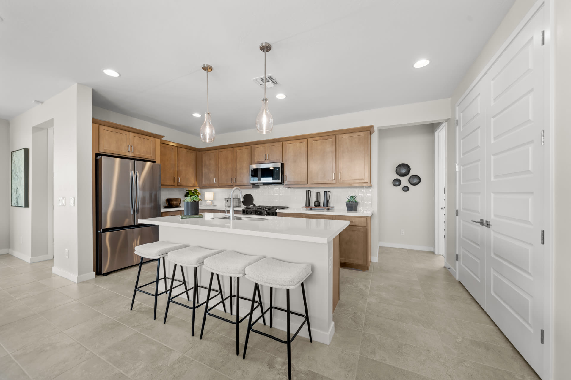 Kitchen | Radiance Floorplan | Elara at Moonlight | New Homes in Maricopa, AZ by Landsea Homes