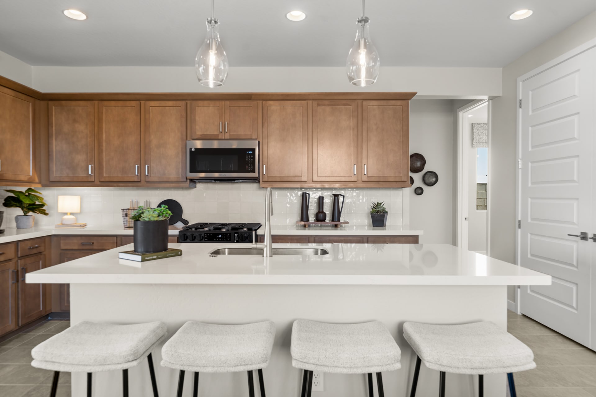 Kitchen | Radiance Floorplan | Elara at Moonlight | New Homes in Maricopa, AZ by Landsea Homes