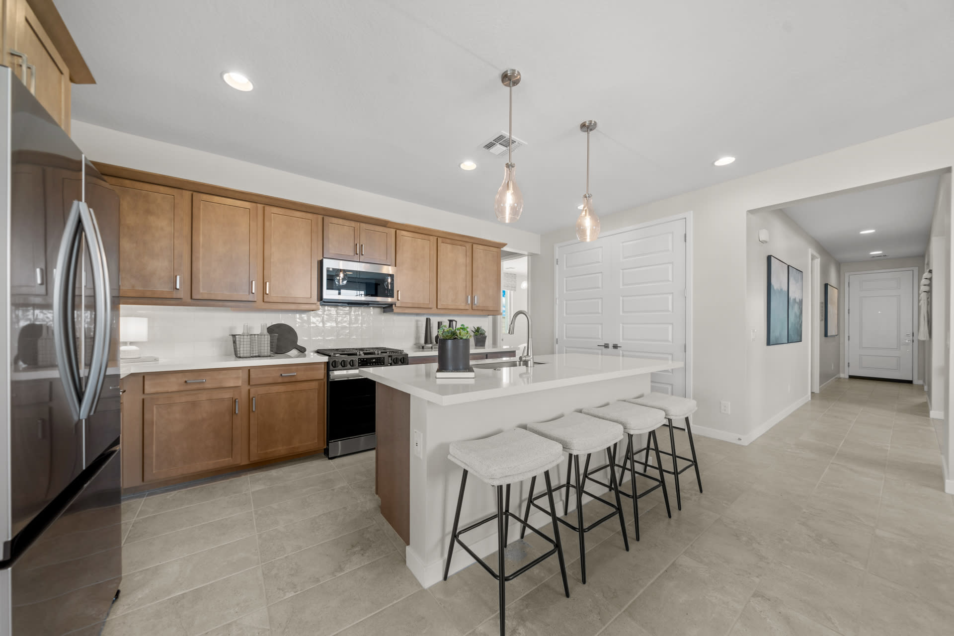 Kitchen | Radiance Floorplan | Elara at Moonlight | New Homes in Maricopa, AZ by Landsea Homes