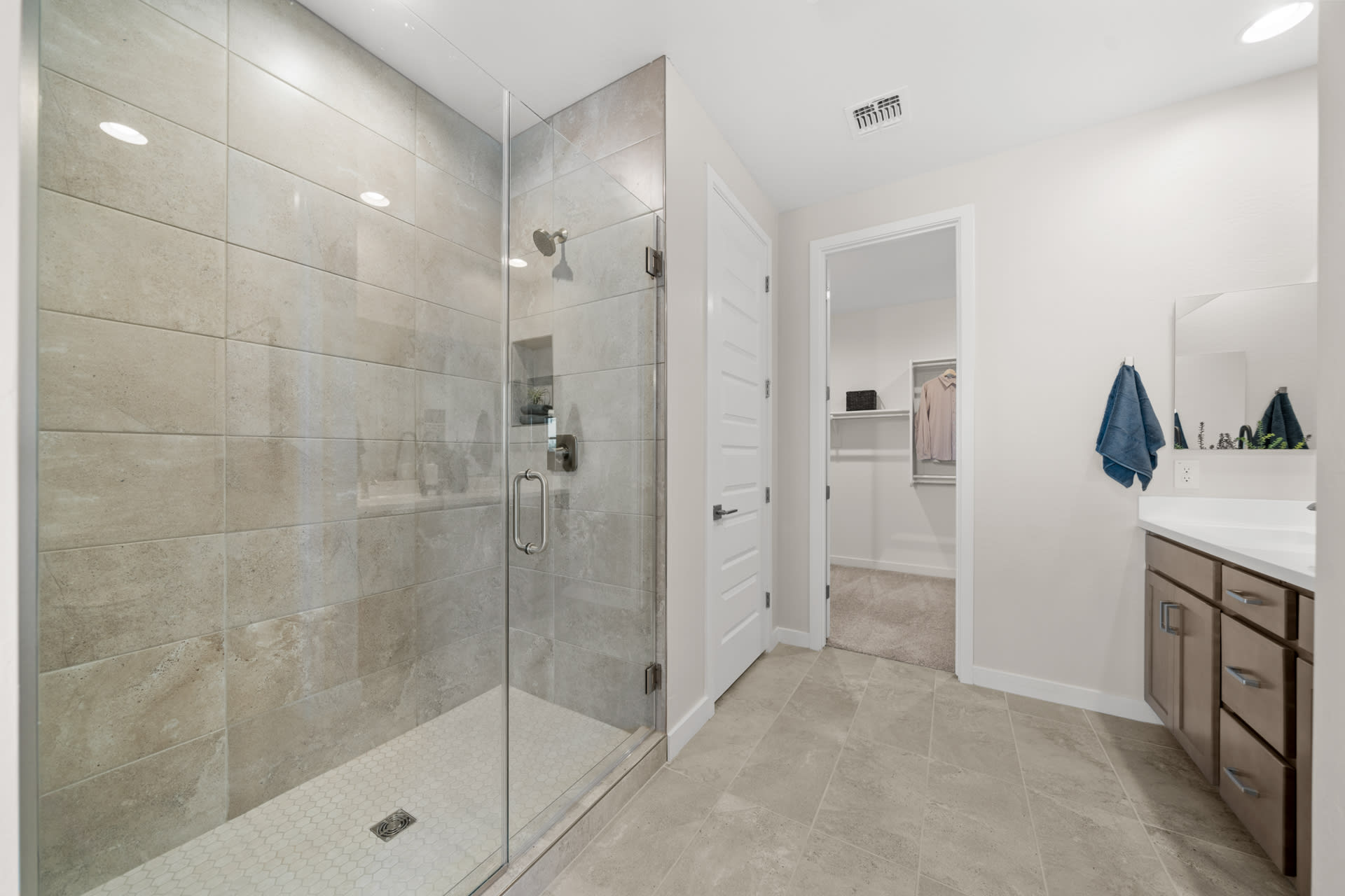 Primary Bathroom Shower | Radiance Floorplan | Elara at Moonlight | New Homes in Maricopa, AZ by Landsea Homes