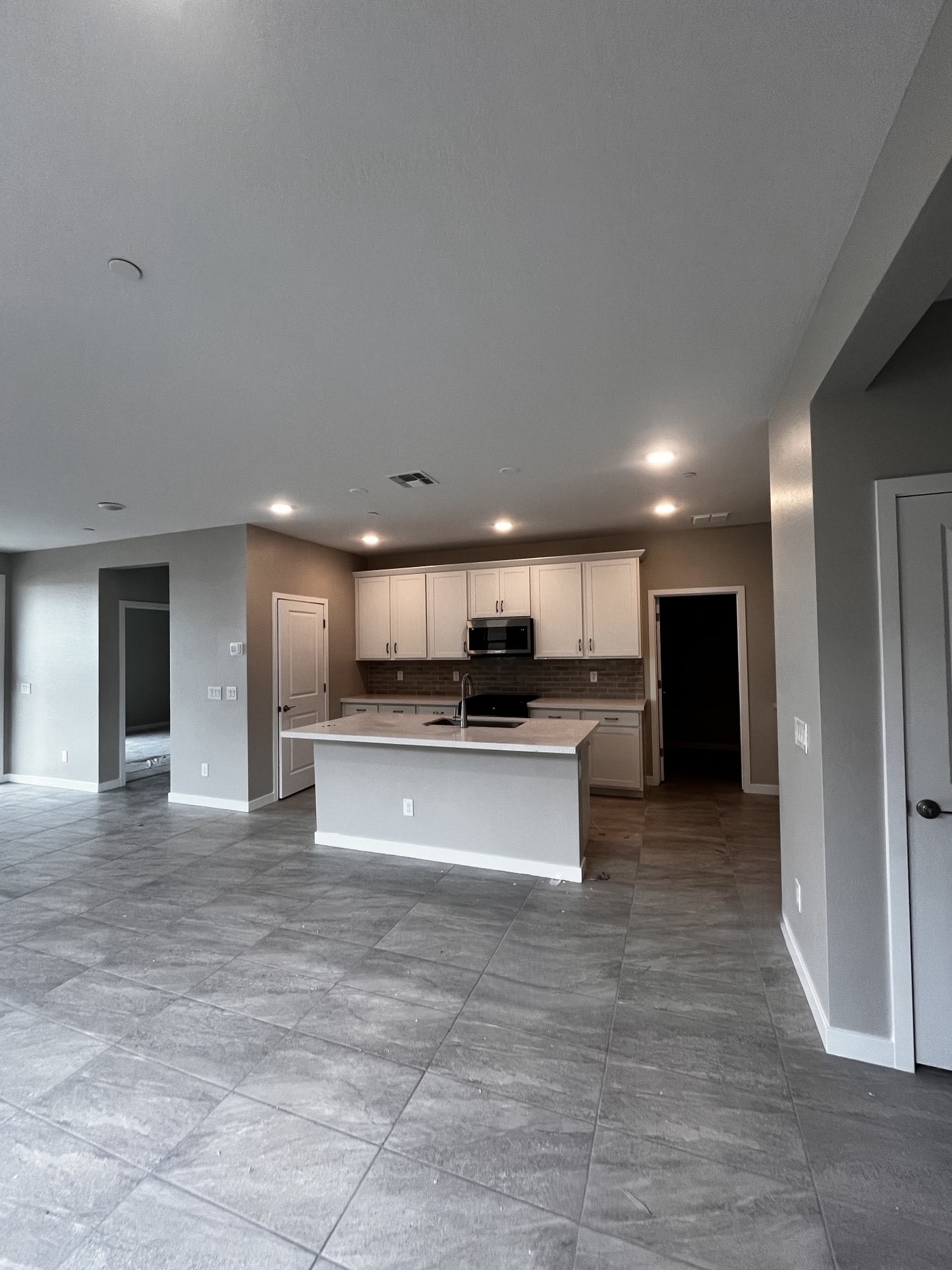 Lot 43 | Dining Area & Kitchen | Mira Vista at Victory in Buckeye, AZ by Landsea Homes