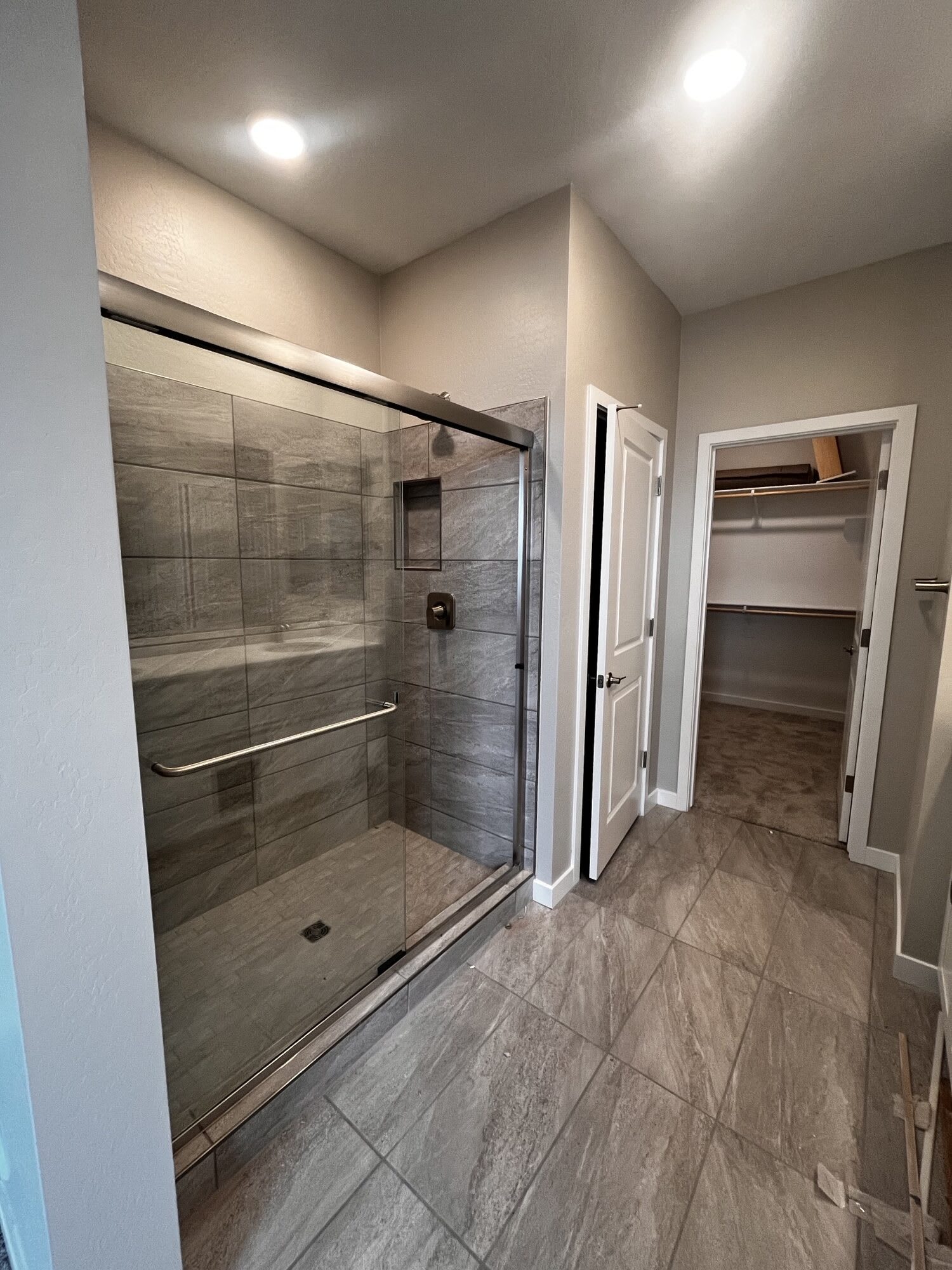 Lot 43 | Primary Walk-in Shower | Mira Vista at Victory in Buckeye, AZ by Landsea Homes