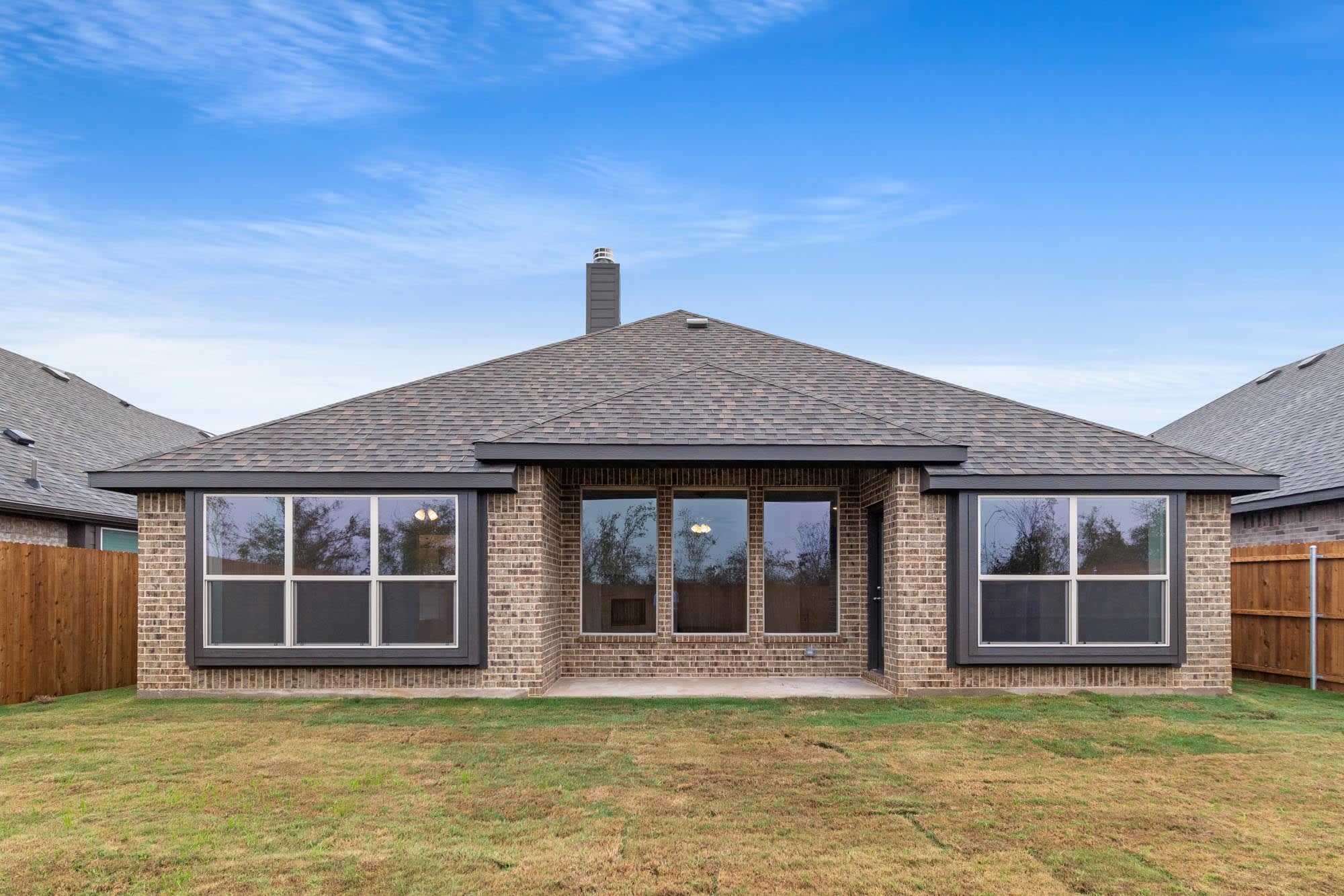Backyard | Concept 1660 at Waterford Park in Weatherford, TX by Landsea Homes