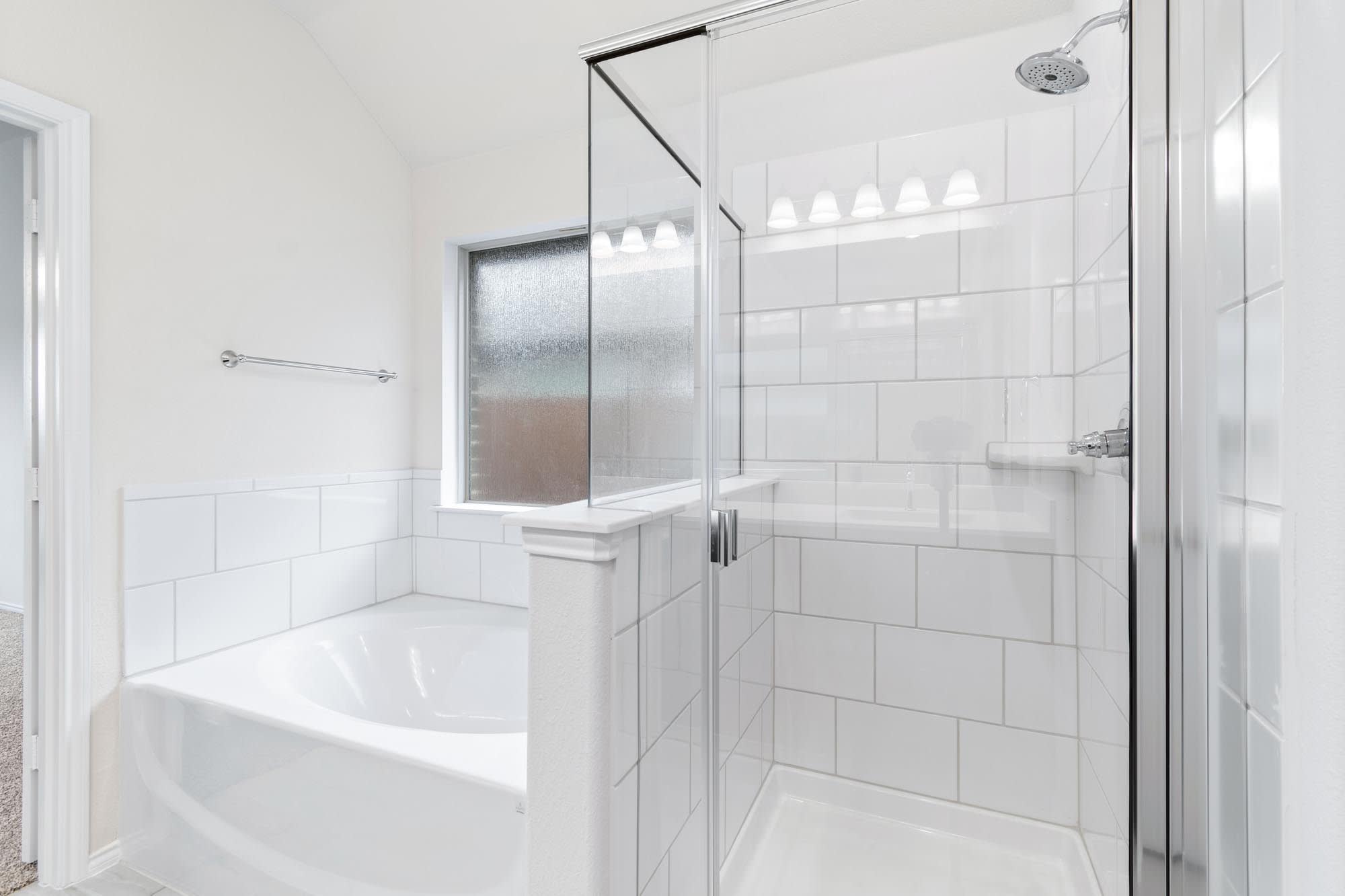 Primary Bathroom | Concept 1660 at Waterford Park in Weatherford, TX by Landsea Homes