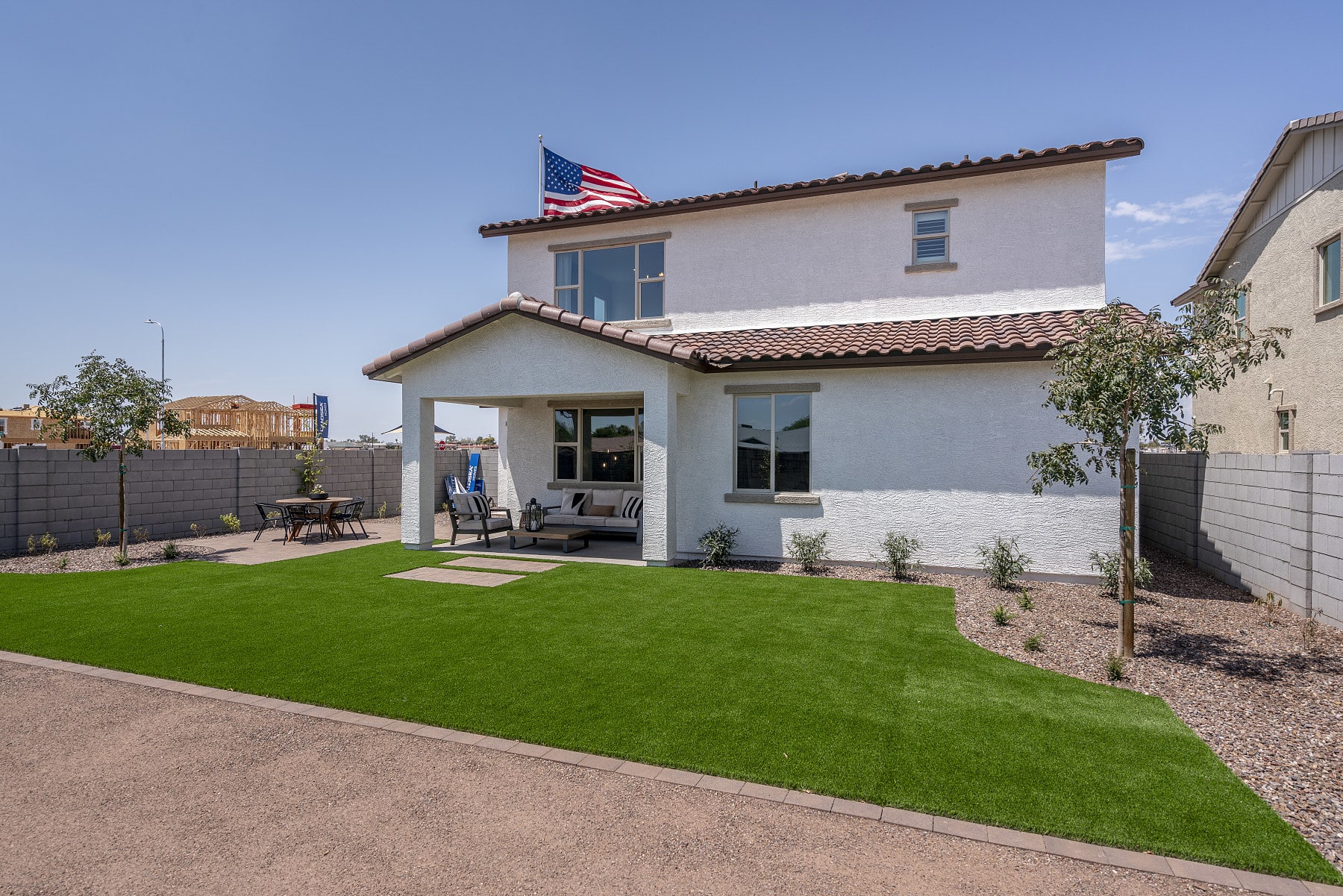 Backyard with Covered Patio | * Furniture Shown In Photo Not Included with Purchase of Home